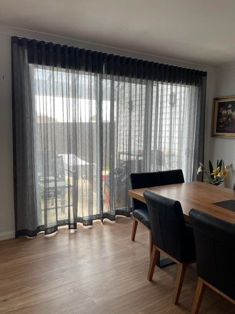 Stylish Living Room With Curtains — Curtains in Falls Creek, NSW