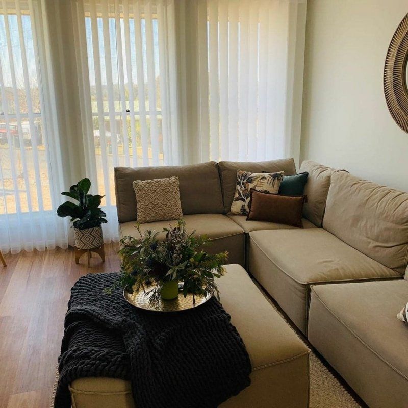 Man Installing Window Shades At Home — Co-ordinations Blinds & Awnings in Falls Creek, NSW