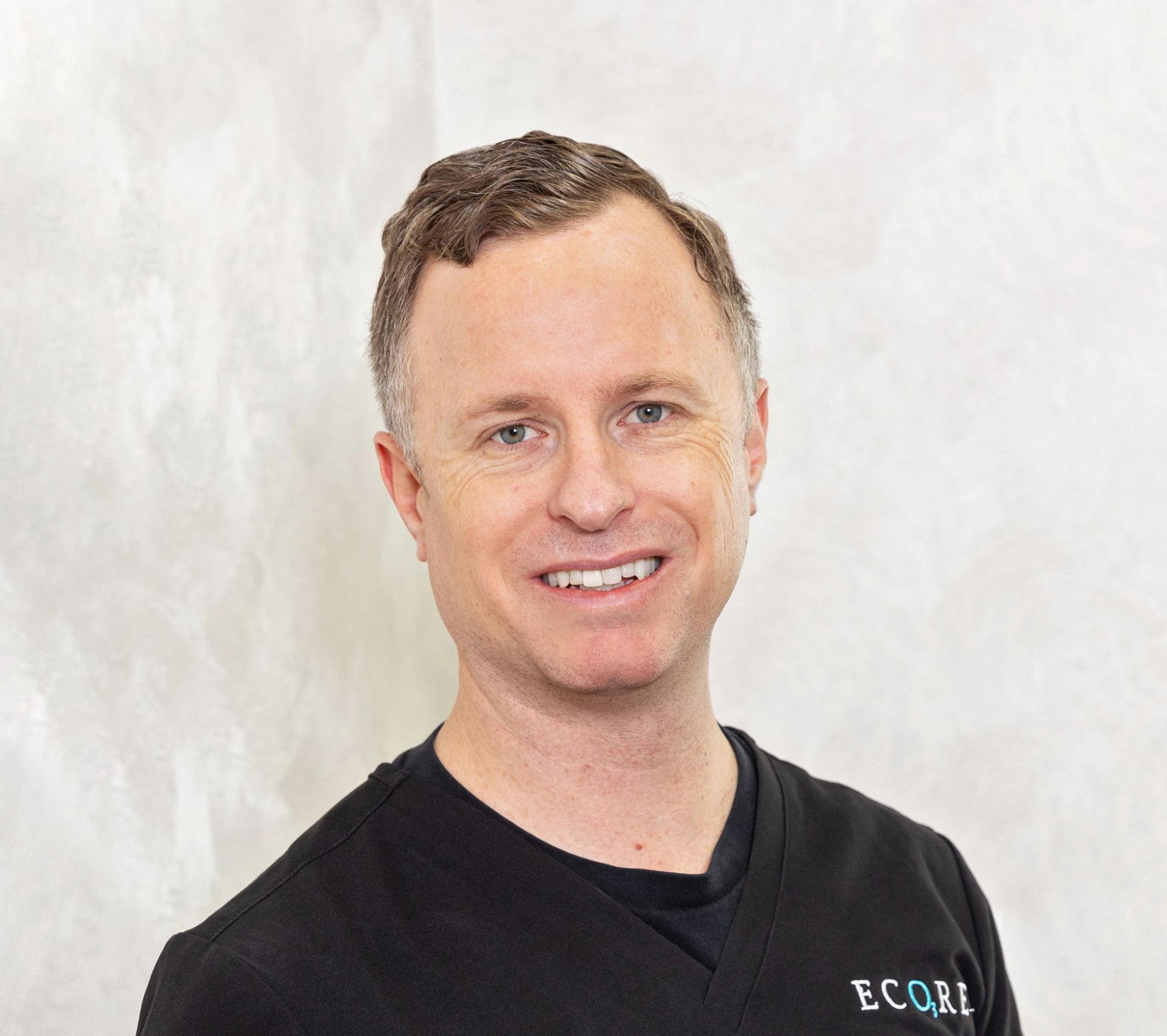 Dr. Andrew Keating discussing acupuncture and Traditional East Asian Medicine at Ecore Wellness in E