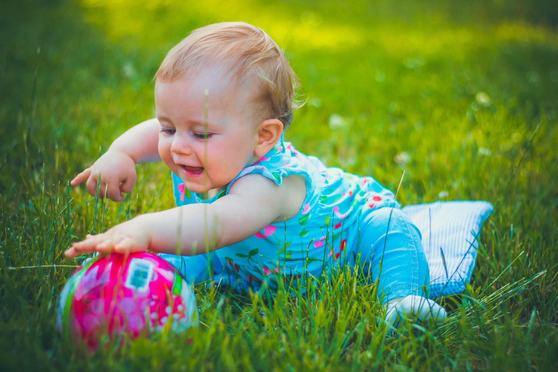 Baby playing with a ball
