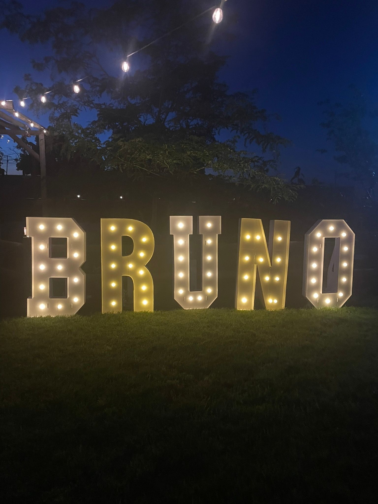 Lit-up marquee letters spelling 