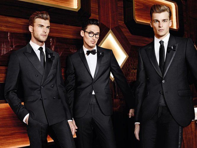 3 uomini con abito elegante