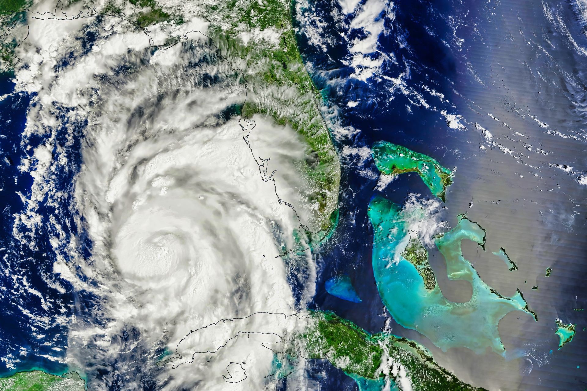 An aerial view of a hurricane in the middle of the ocean