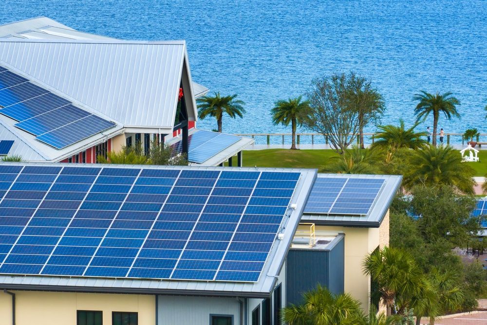 A house with a lot of solar panels on the roof