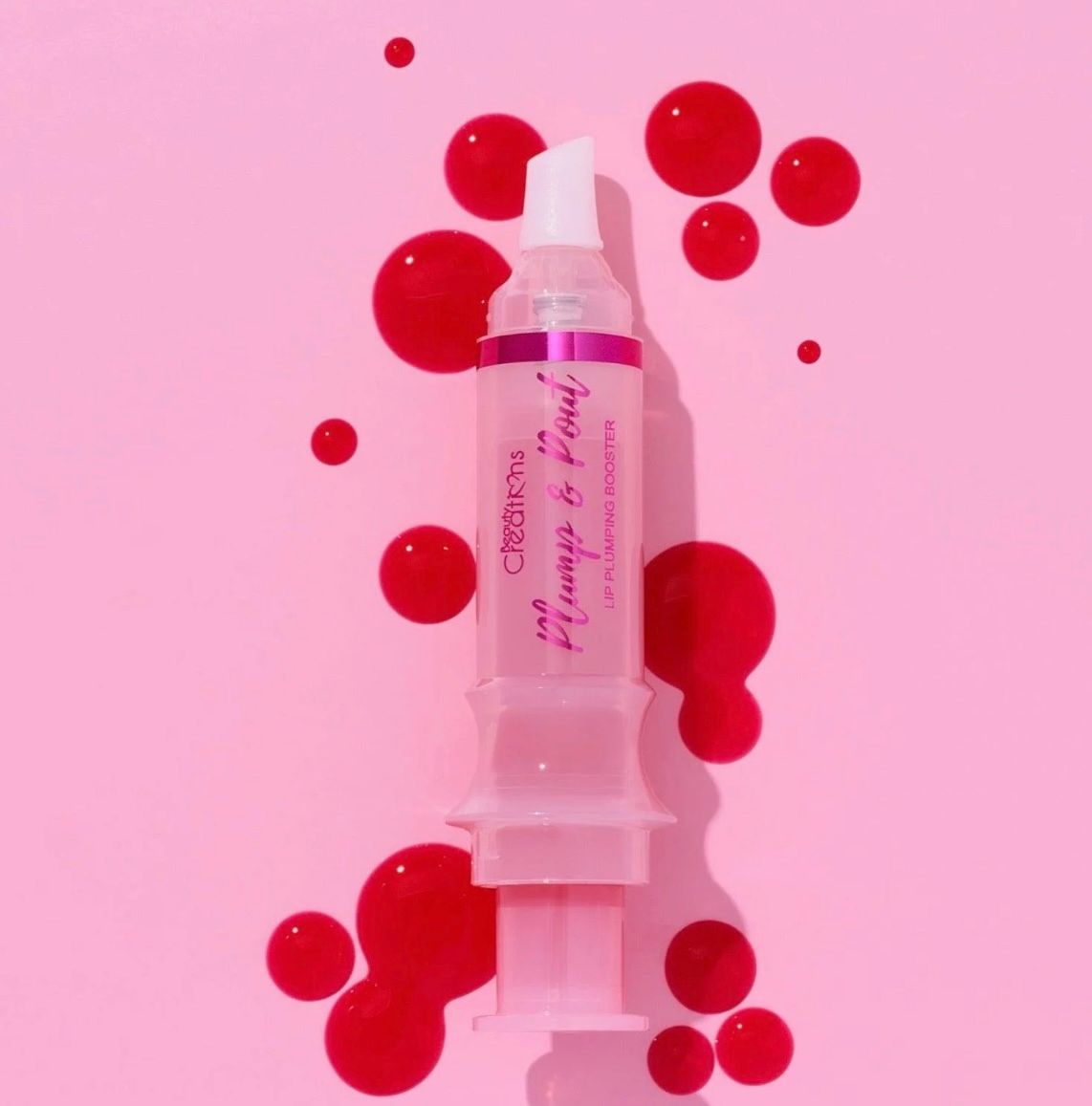 A syringe filled with a liquid that says me always be proud.