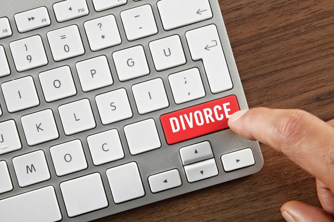 A Person Is Pressing a Red Button on a Keyboard That Says Divorce | Sydney, NSW | Online Divorce Australia