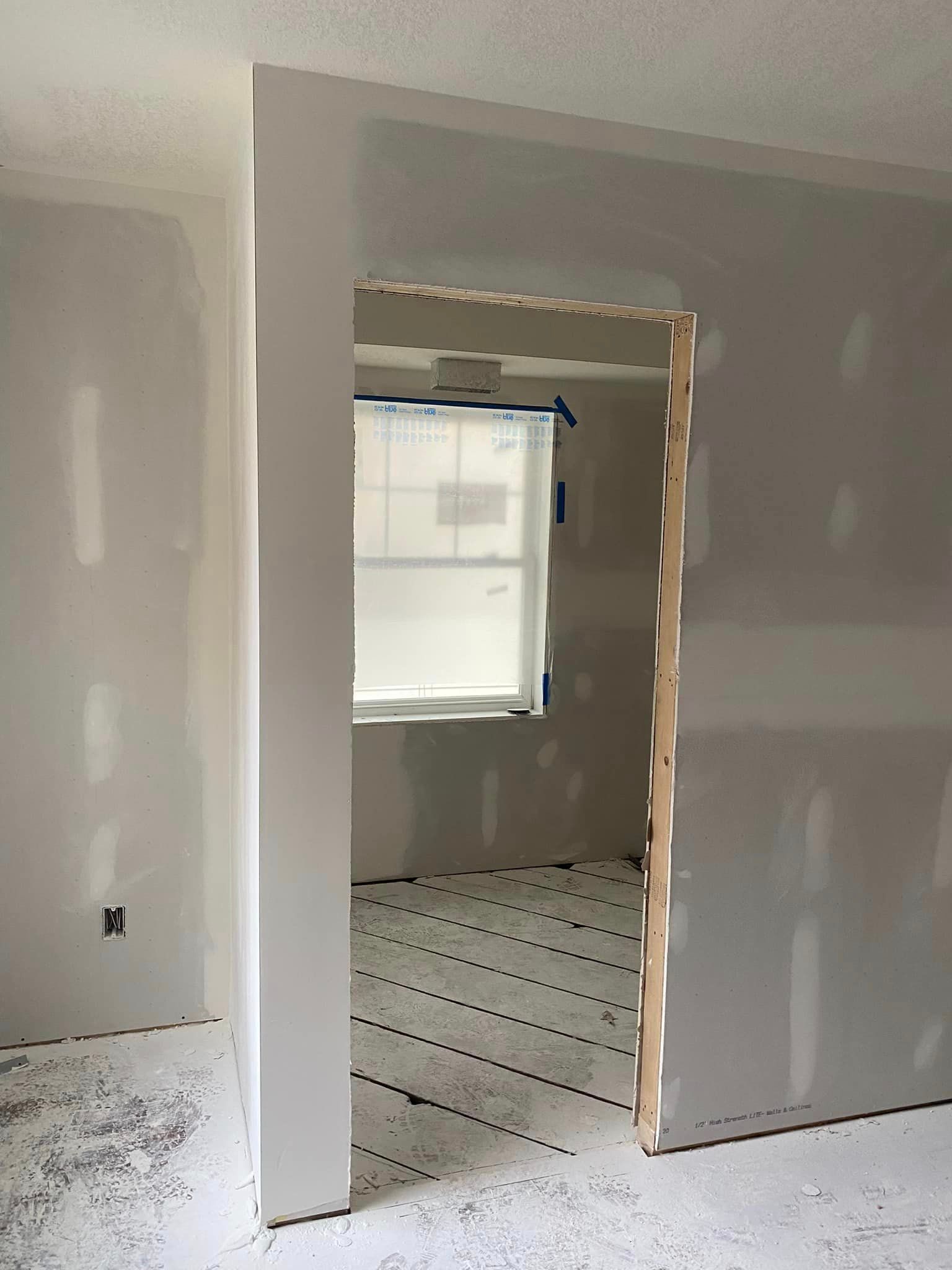 There is a window in the middle of the room.