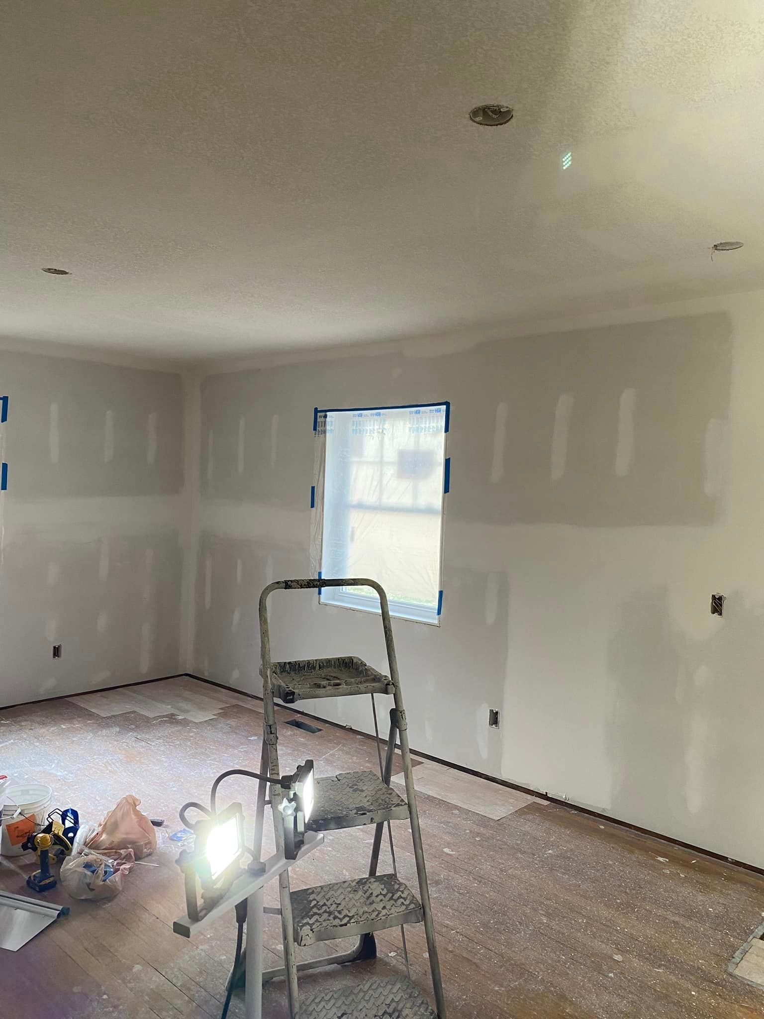 There is a ladder in the middle of the room.