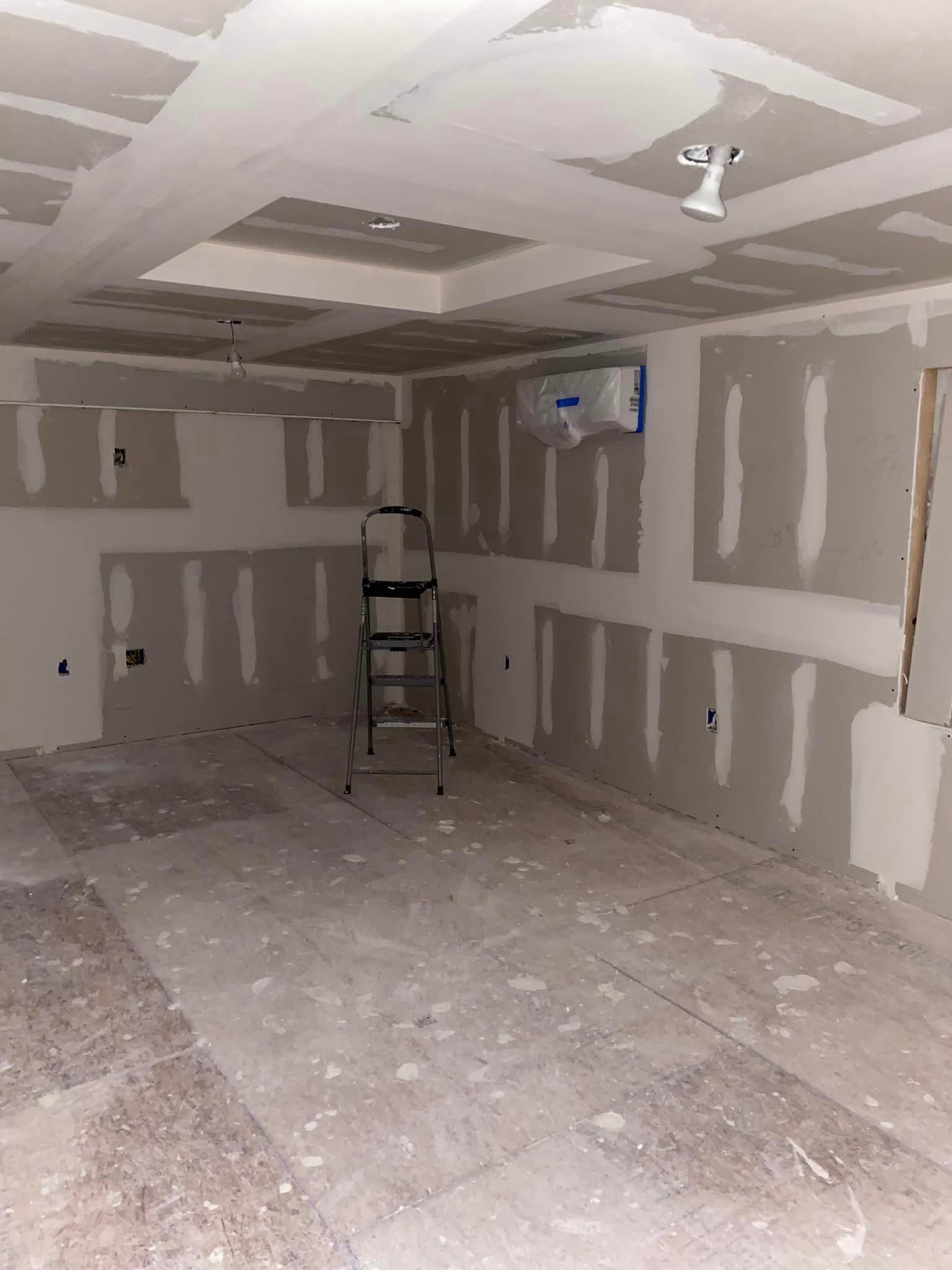 There is a ladder in the middle of the room.