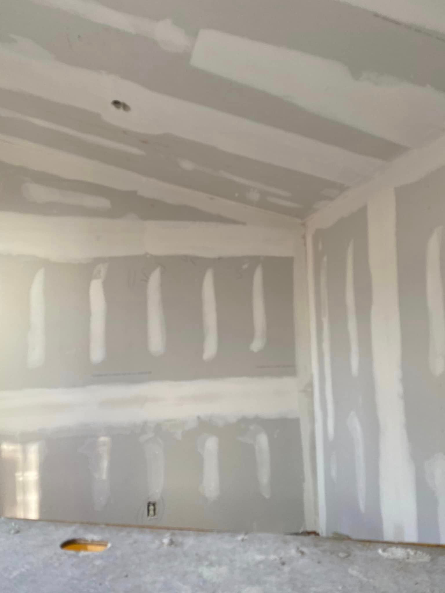 There is a hole in the floor in the middle of the room.