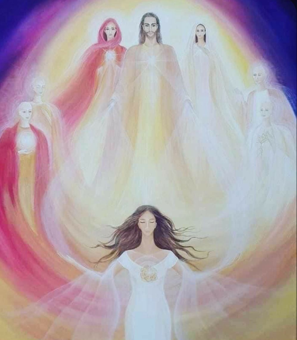 Hands releasing a butterfly into the golden light of a field at sunset.