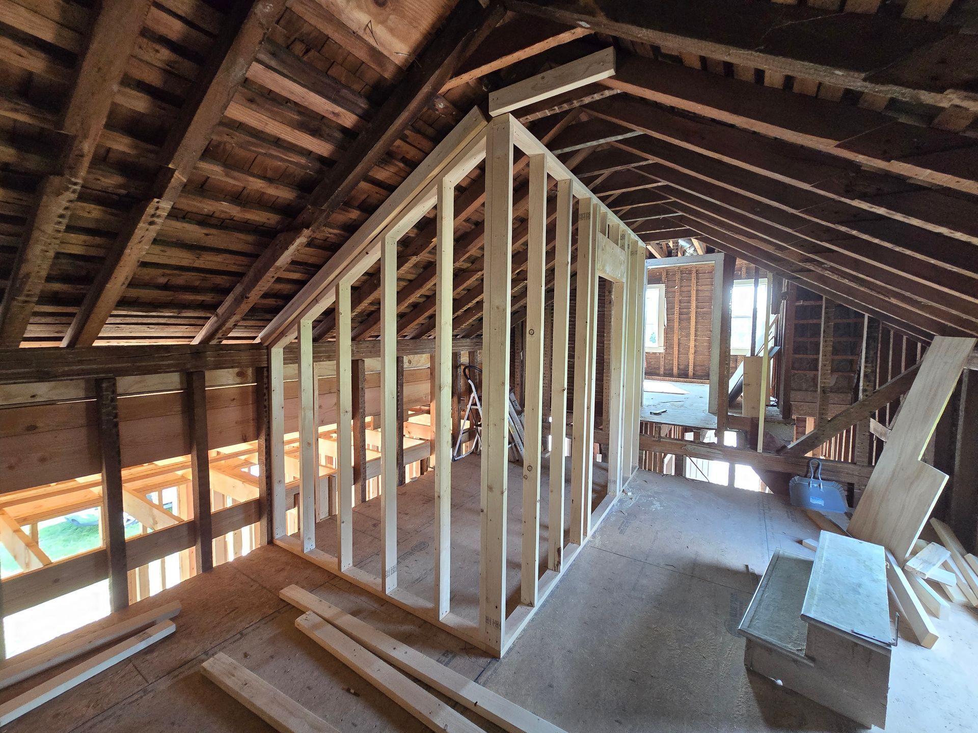 The attic of a house is being built with wooden frames.