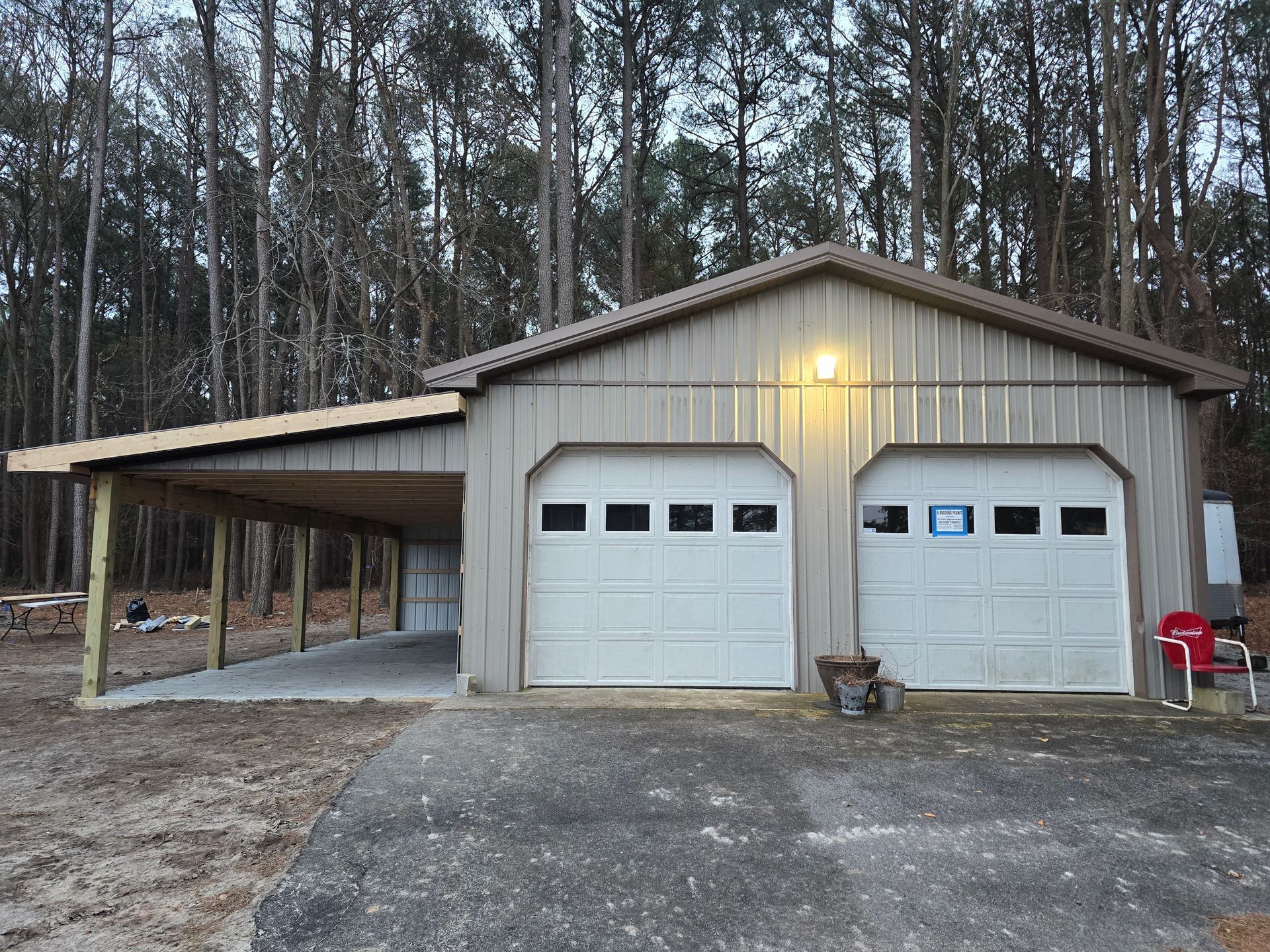 A garage with a carport attached to it