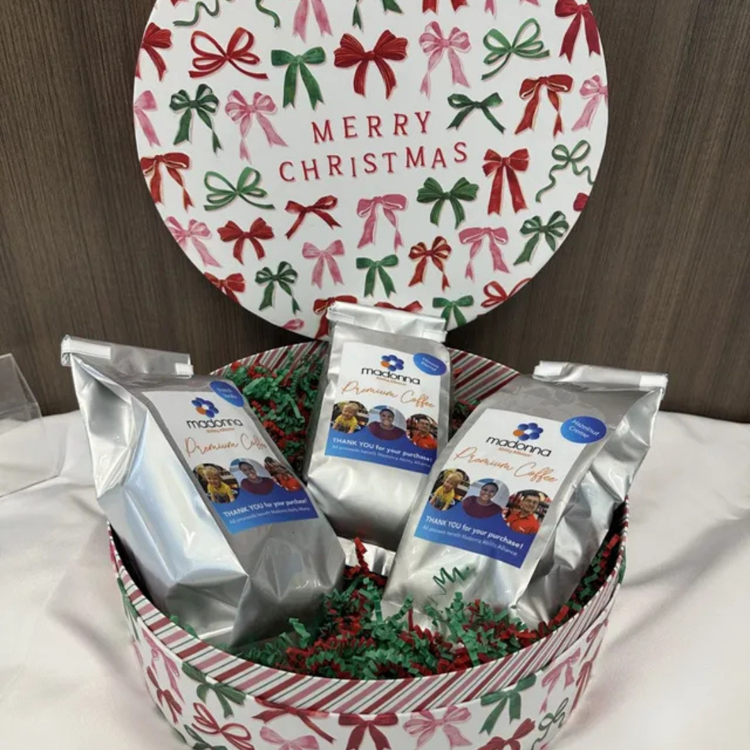 Coffee gift basket with three bags of coffee and a
