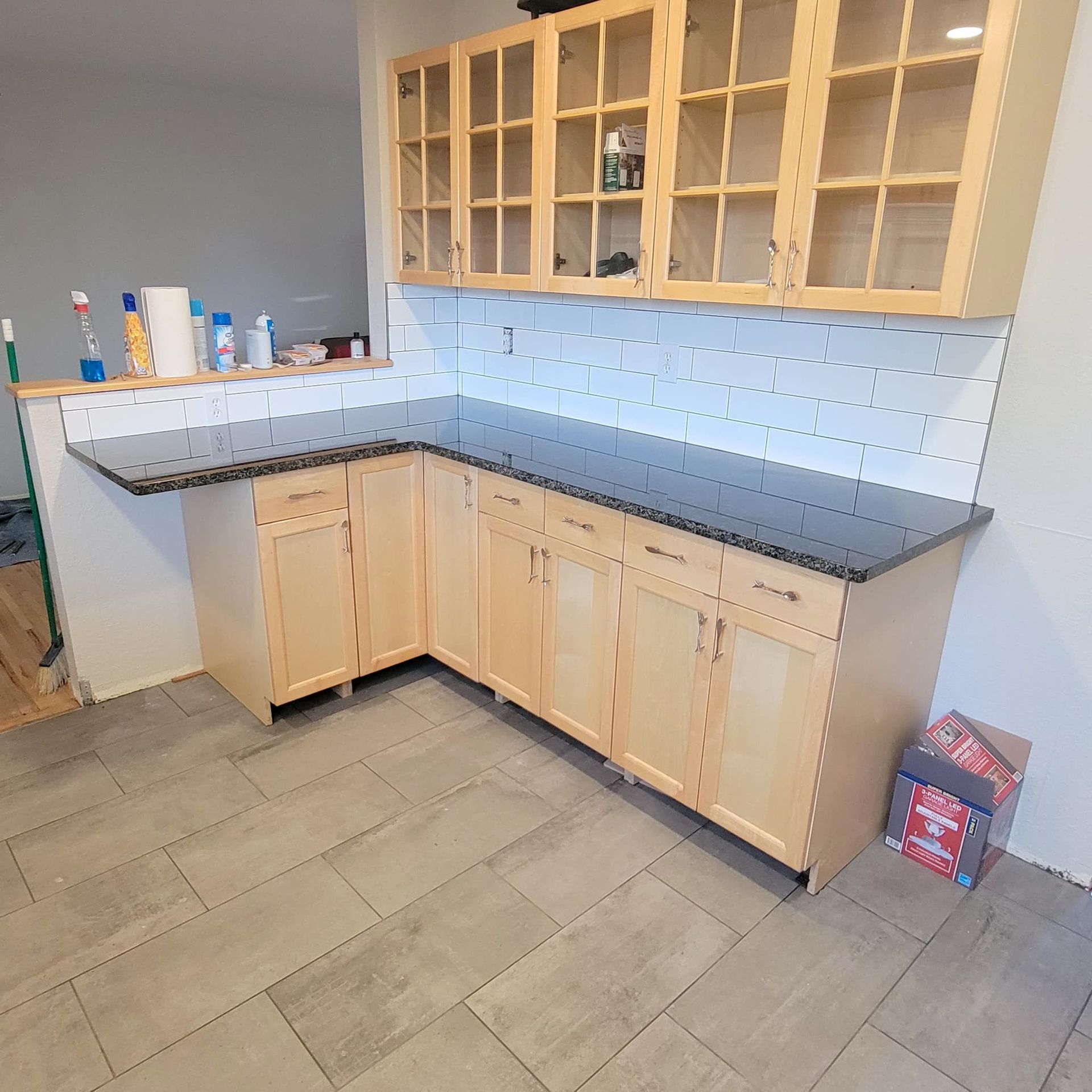 a kitchen with luxury vinyl tile flooring