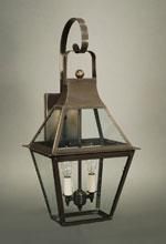 Bronze outdoor wall lantern with two light bulbs behind clear glass panels.