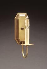 Brass wall sconce with a candle-shaped bulb.