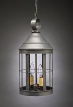 Metal lantern pendant light with clear glass panels, hanging from a chain.