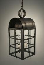 Black metal lantern with glass panels, hanging from a chain, with two lit lightbulbs inside.