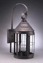 Dark metal outdoor wall lantern with glass panels.