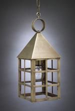 Brass lantern with square frame and pyramid top, suspended by a chain.