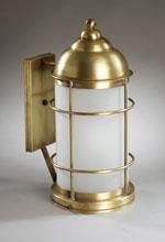 Brass outdoor wall lantern with frosted glass.