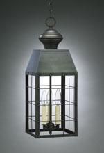 Lantern-style pendant light with a dark metal frame and three candle-shaped bulbs.