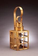 Golden, ornate, cage-like sculpture with an arched handle and ring accents against a dark background.