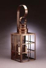 Copper lantern with a cage frame, hook, and candle.