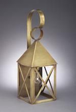 Brass wall-mounted lantern with a pyramid-shaped top and an open, crisscrossed front.