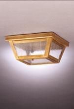 Wooden flush-mount ceiling light fixture with seeded glass panels.