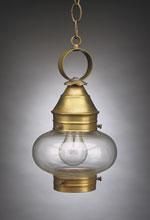 Brass pendant light fixture with clear glass globe, hanging from a chain.
