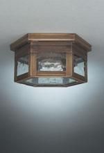 Octagonal bronze ceiling light fixture with glass panels.