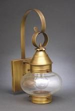 Brass outdoor wall lantern with a clear glass globe.