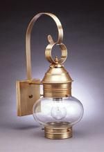 Brass-toned wall-mounted lantern with a clear, rounded glass globe and curved arm.