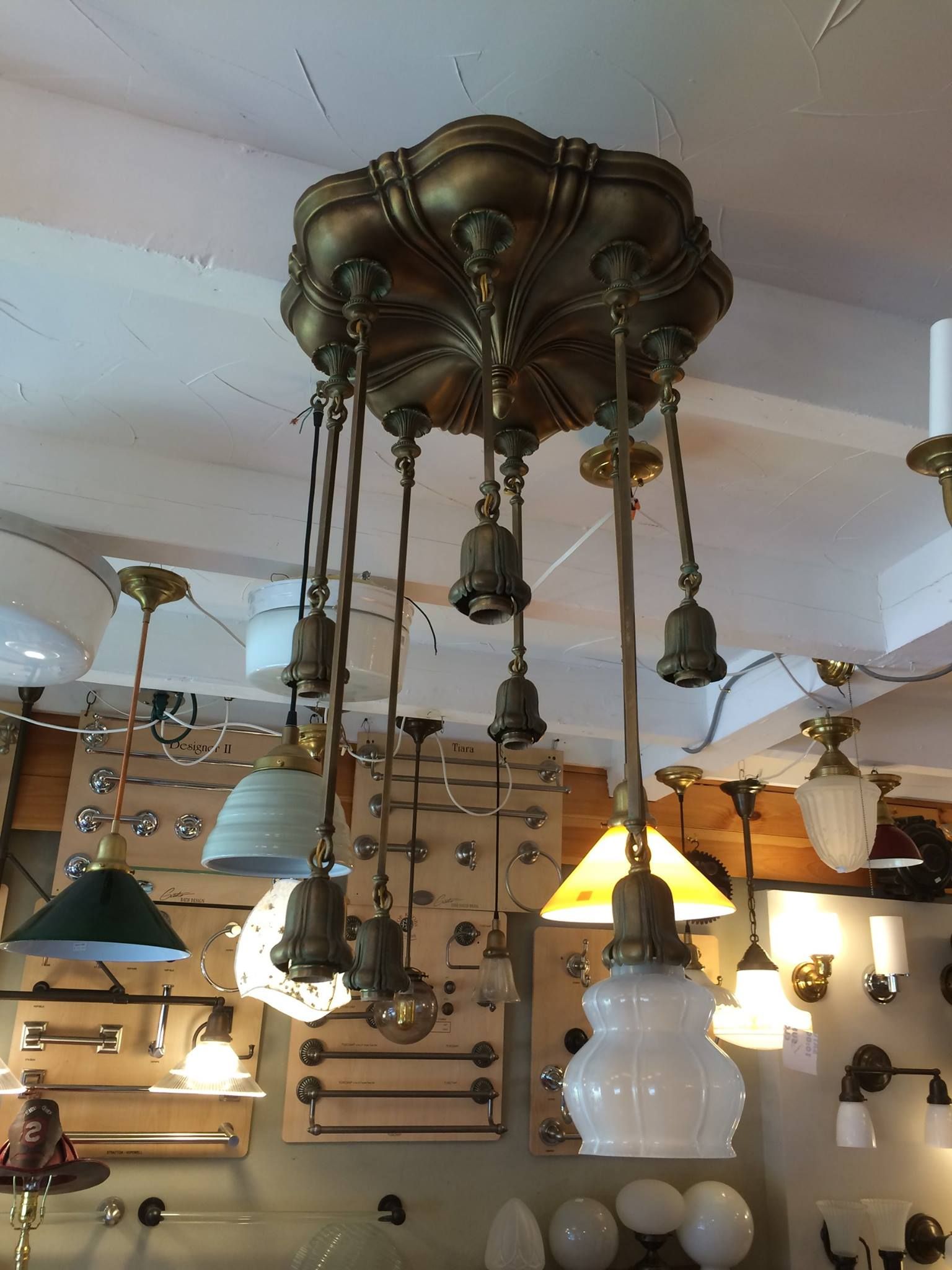 Ornate brass chandelier with multiple hanging lights.