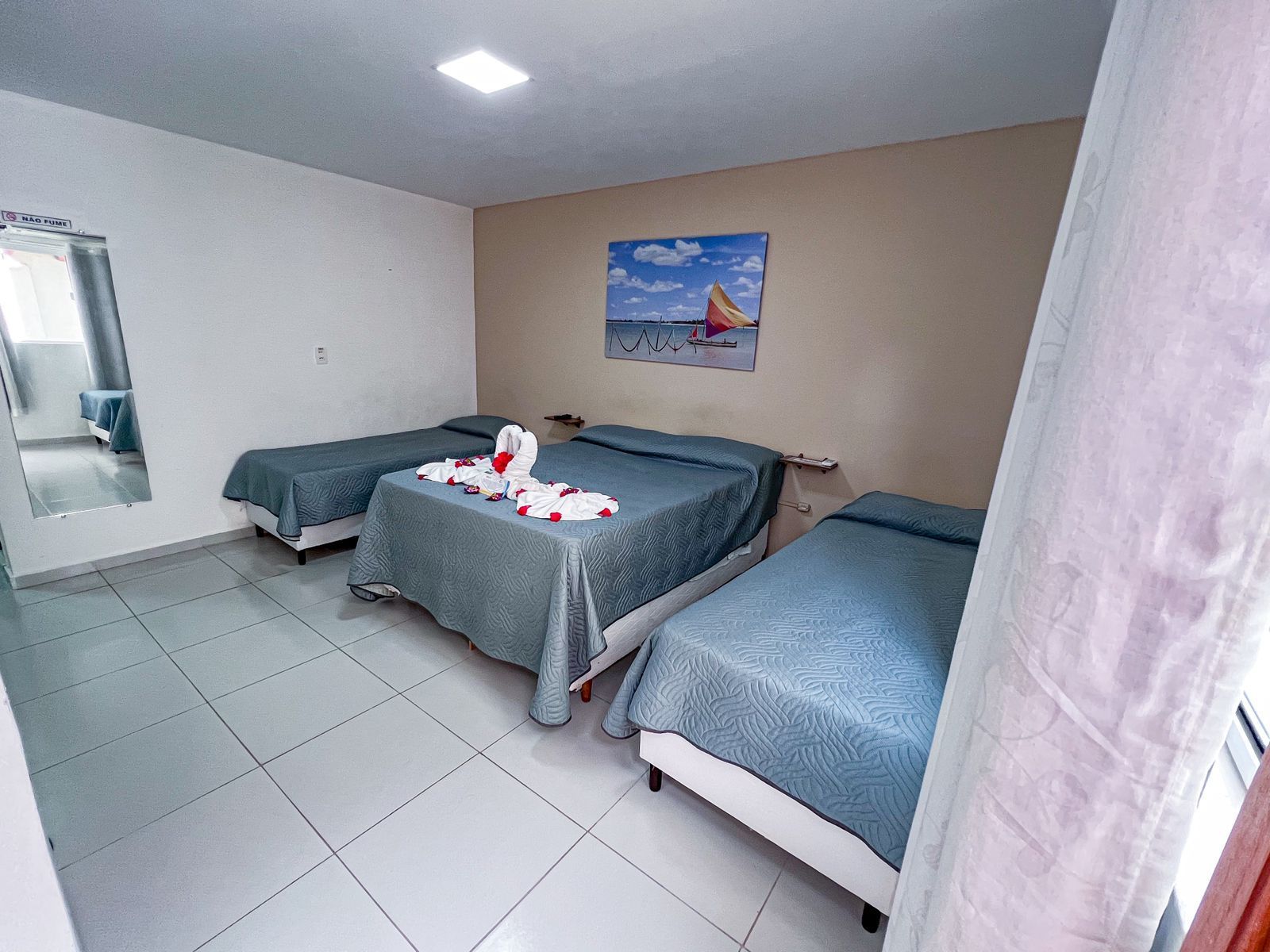 QUÁDRUPLO DELUXE COM VARANDA