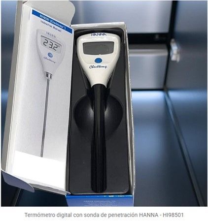 Termómetro digital para alimentos con sonda en caja abierta, que muestra 23,2 grados.