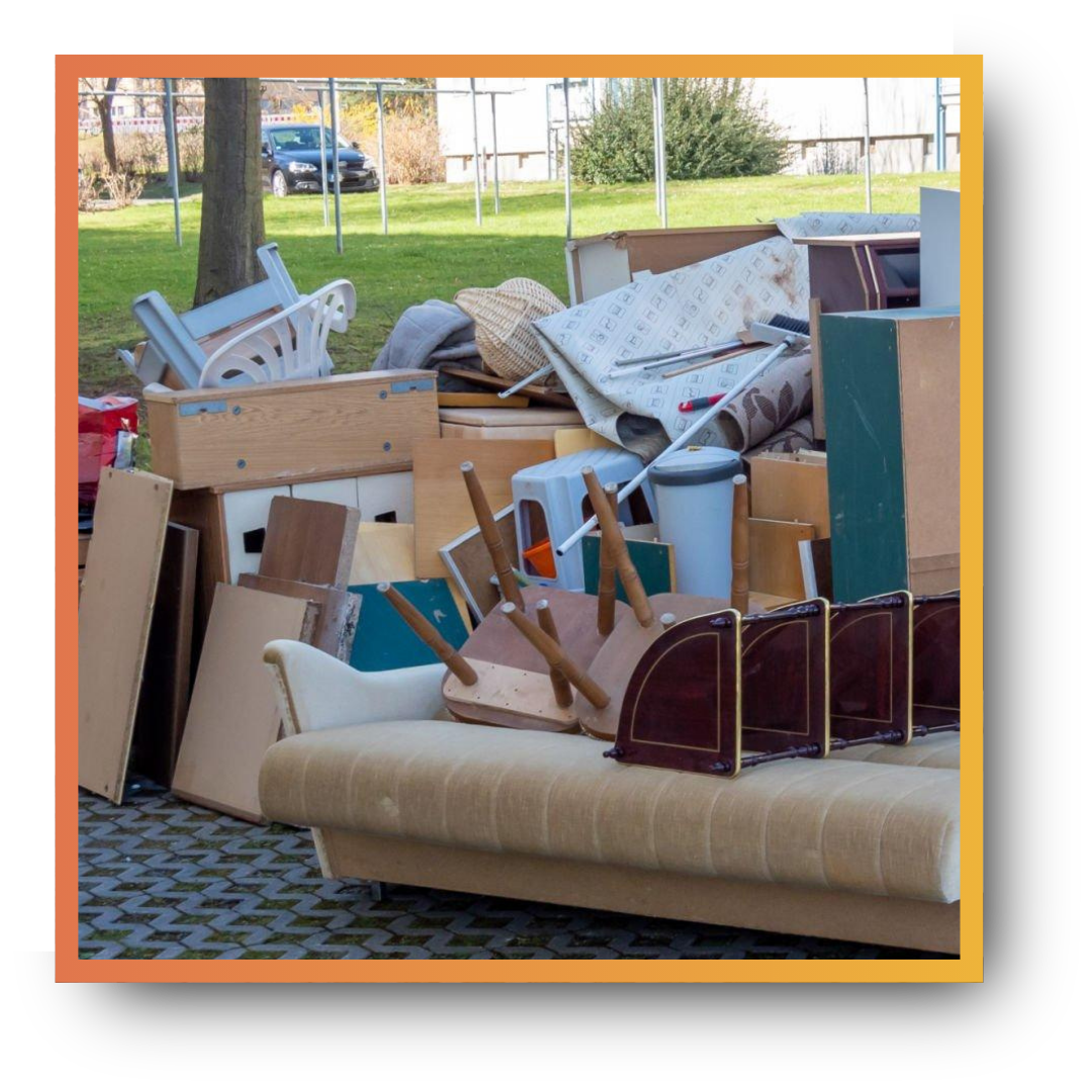 discarded furniture in front of a house