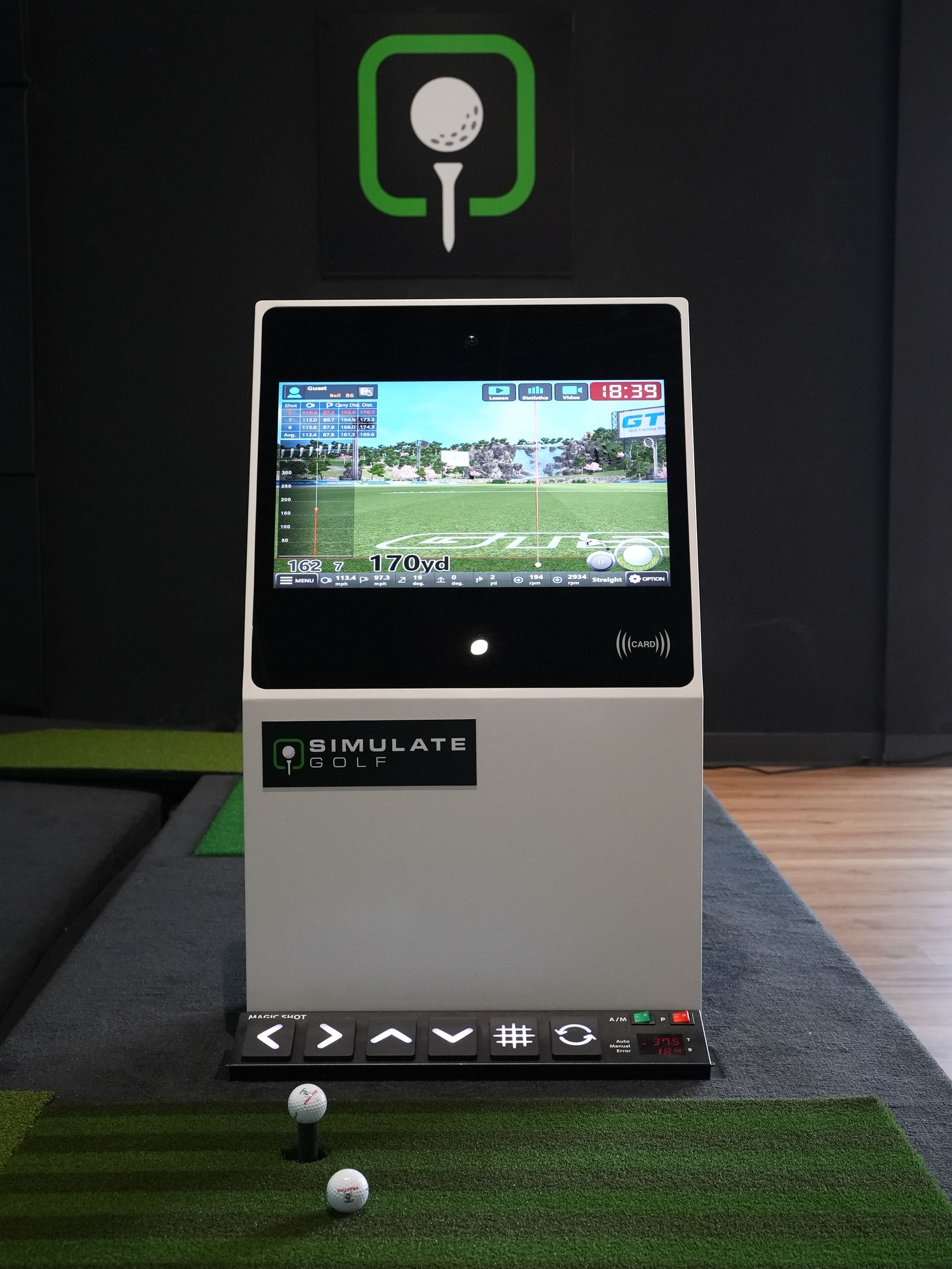 a simulator with a screen that says simulate golf