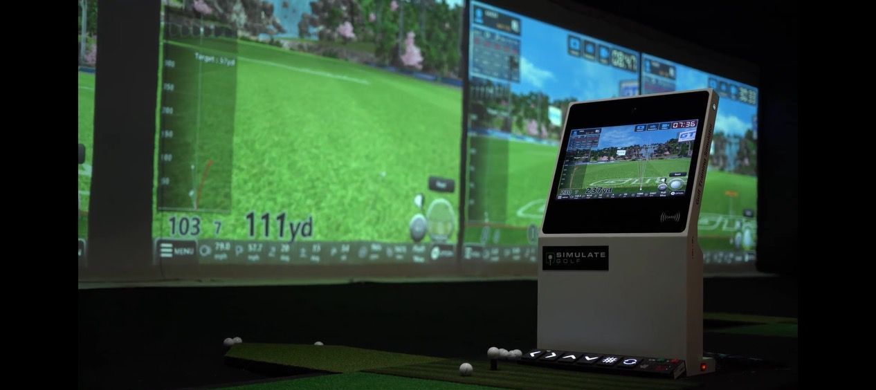 a golf simulator and the screen