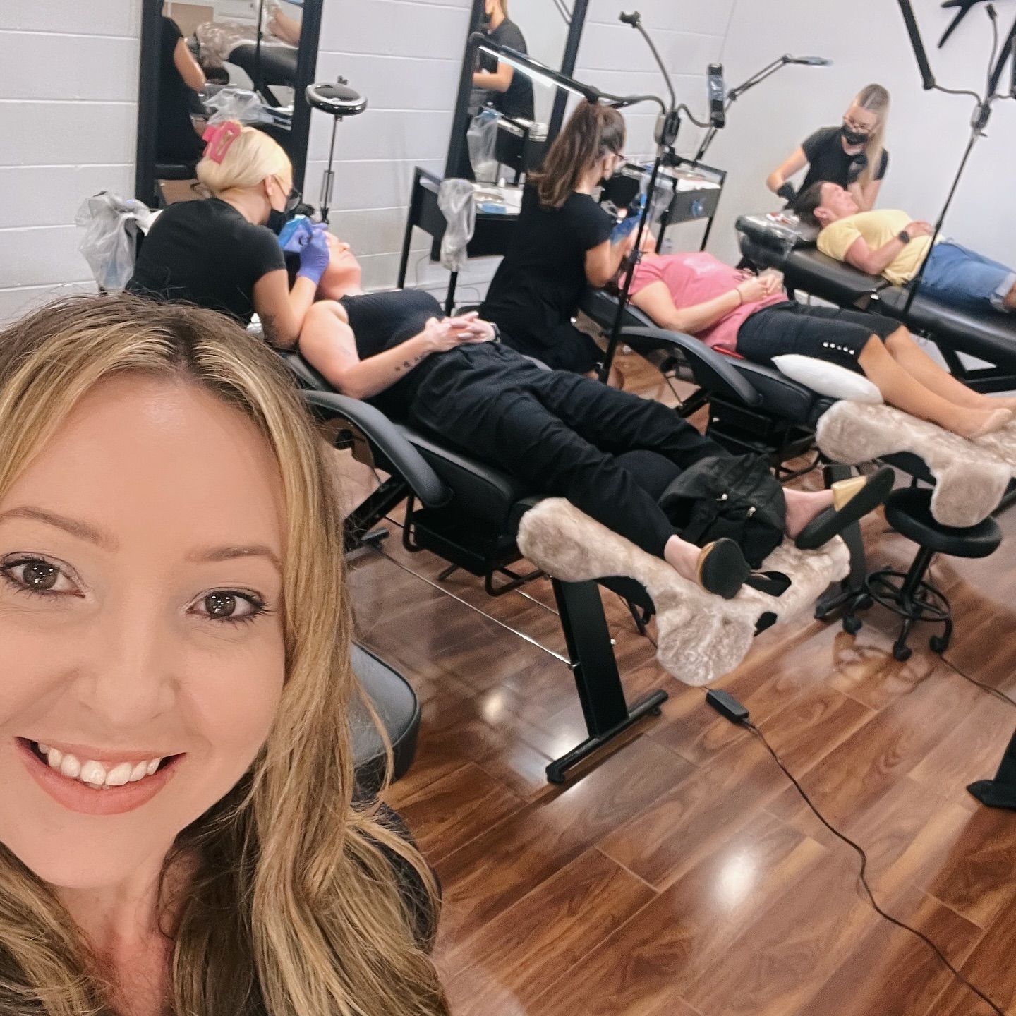 Woman Takes a Selfie in a Room — Artisan Cosmetic Tattoo & Beauty in Worongary, QLD