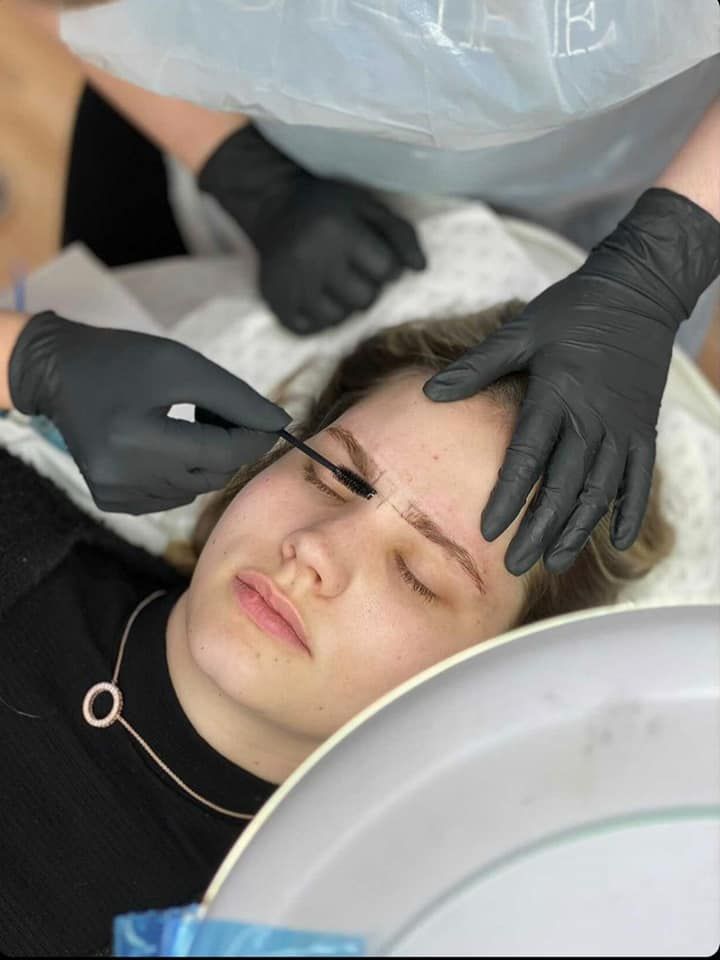 Person Receiving Eyebrow Grooming Treatment — Artisan Cosmetic Tattoo & Beauty in Worongary, QLD