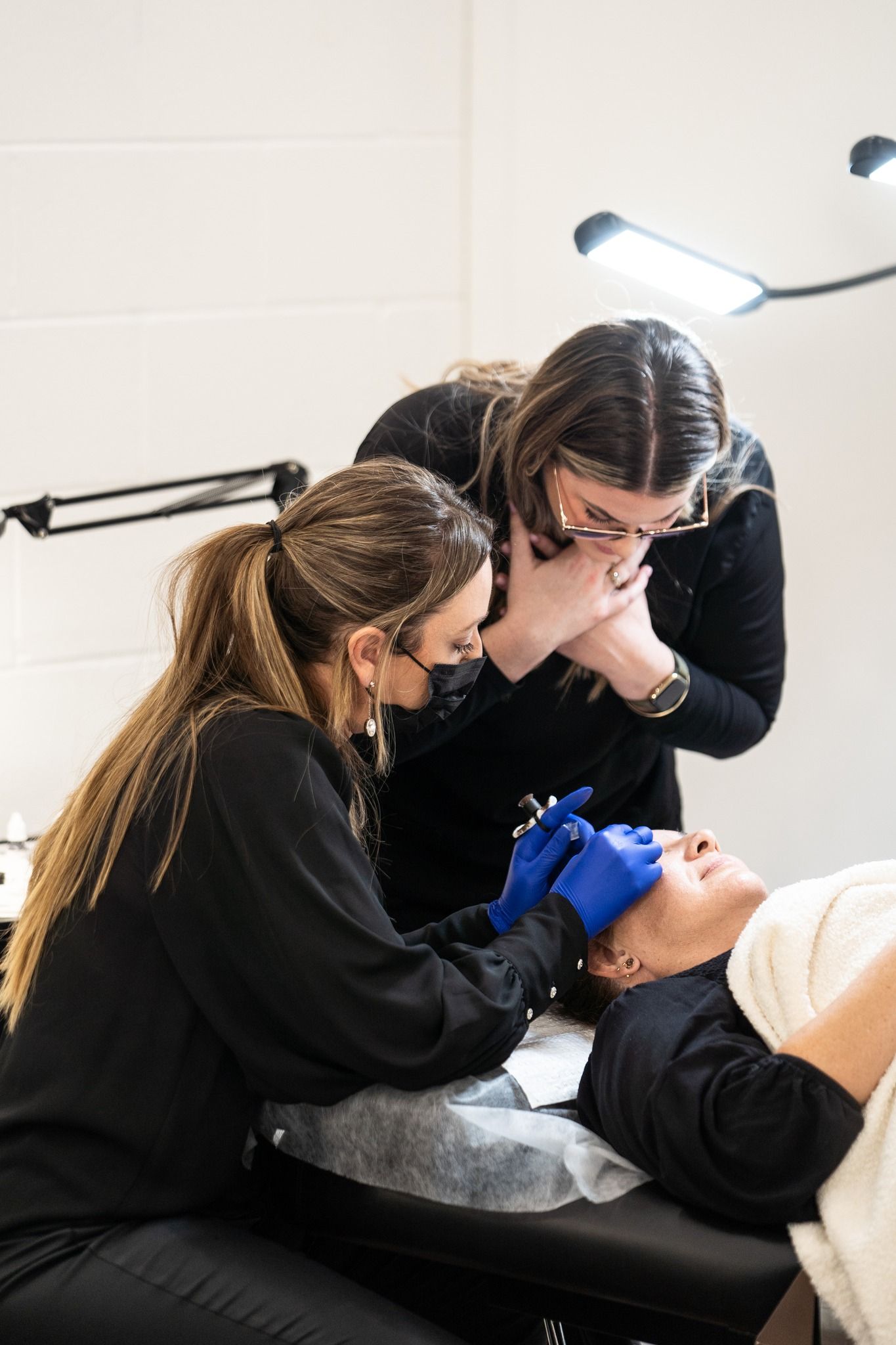 A Woman Receiving Eyebrow Procedure — Artisan Cosmetic Tattoo & Beauty in Worongary, QLD
