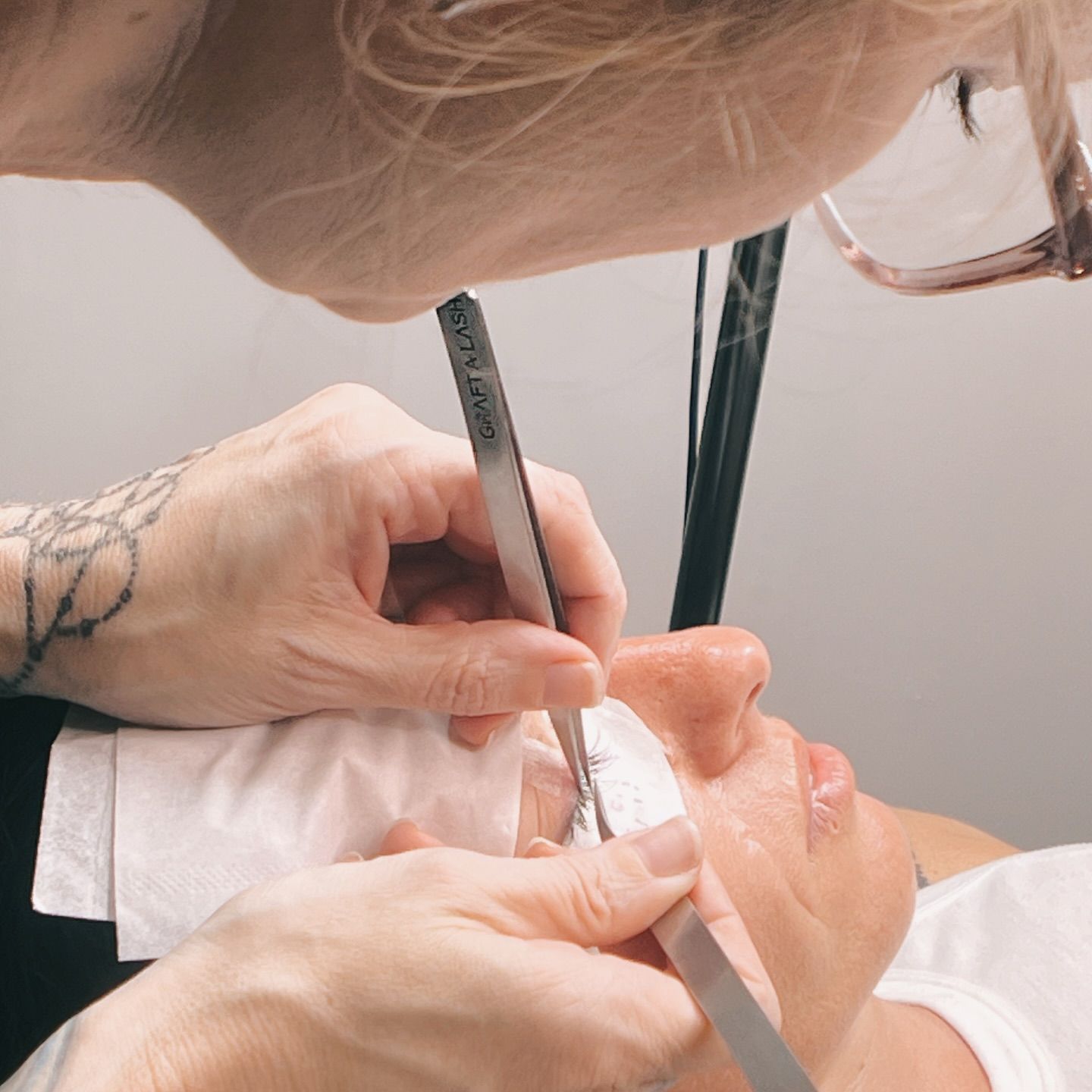 Person Receiving Eyelash Extension Service — Artisan Cosmetic Tattoo & Beauty in Worongary, QLD