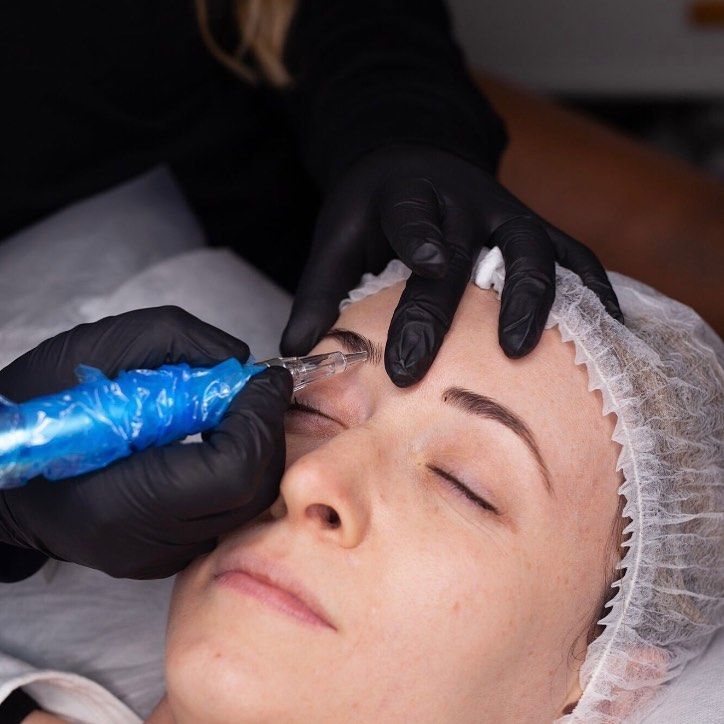 Person Receiving Microblading on an Eyebrow — Artisan Cosmetic Tattoo & Beauty in Worongary, QLD