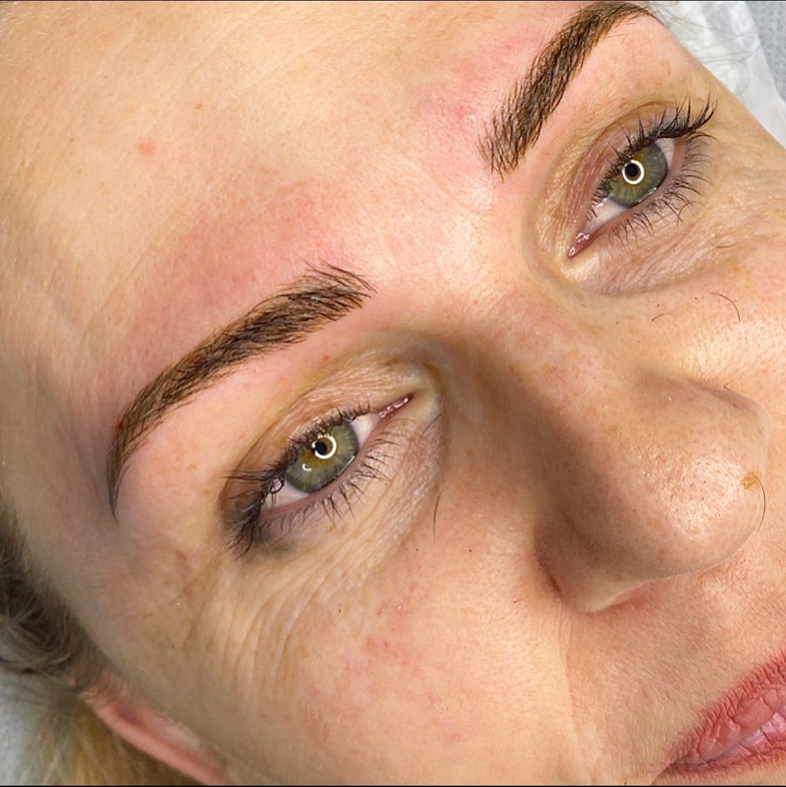 Close-up of a Person With Recently Tattooed Eyebrows — Artisan Cosmetic Tattoo & Beauty in Worongary, QLD