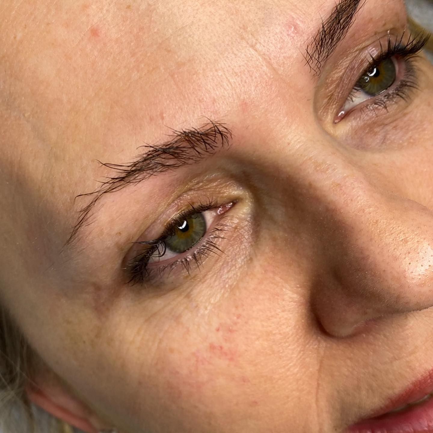 Close-up of a Person's Face With Brown Eyebrows — Artisan Cosmetic Tattoo & Beauty in Worongary, QLD