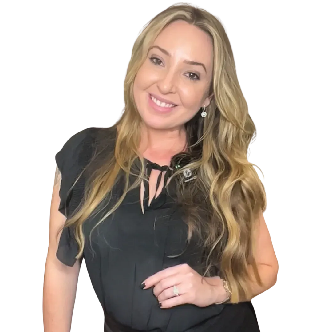 Woman with long blonde hair, wearing a black blouse, smiling — Artisan Cosmetic Tattoo & Beauty in Worongary, QLD