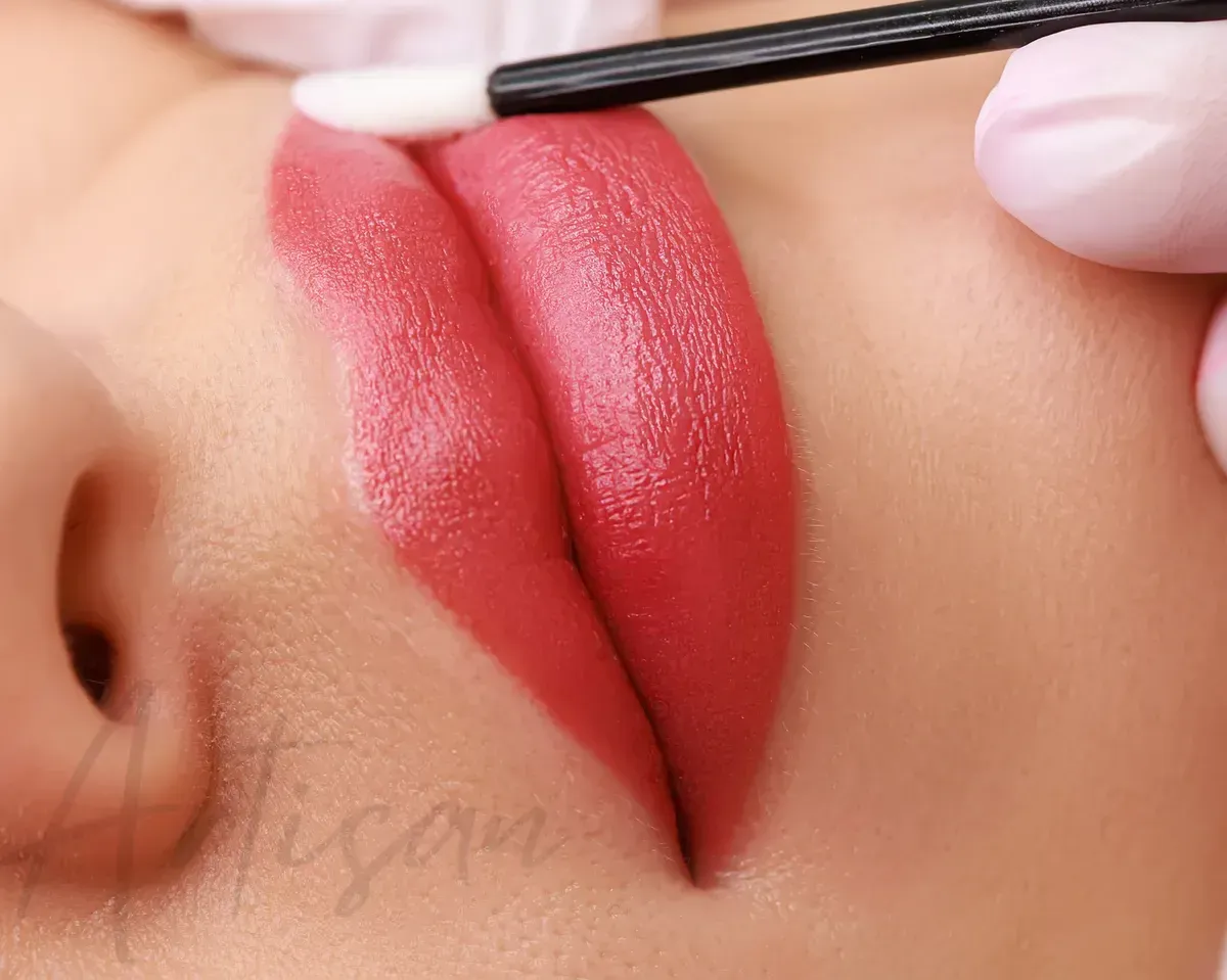 Woman With Blonde Hair and Bold Red Eyeshadow — Artisan Cosmetic Tattoo & Beauty in Worongary, QLD